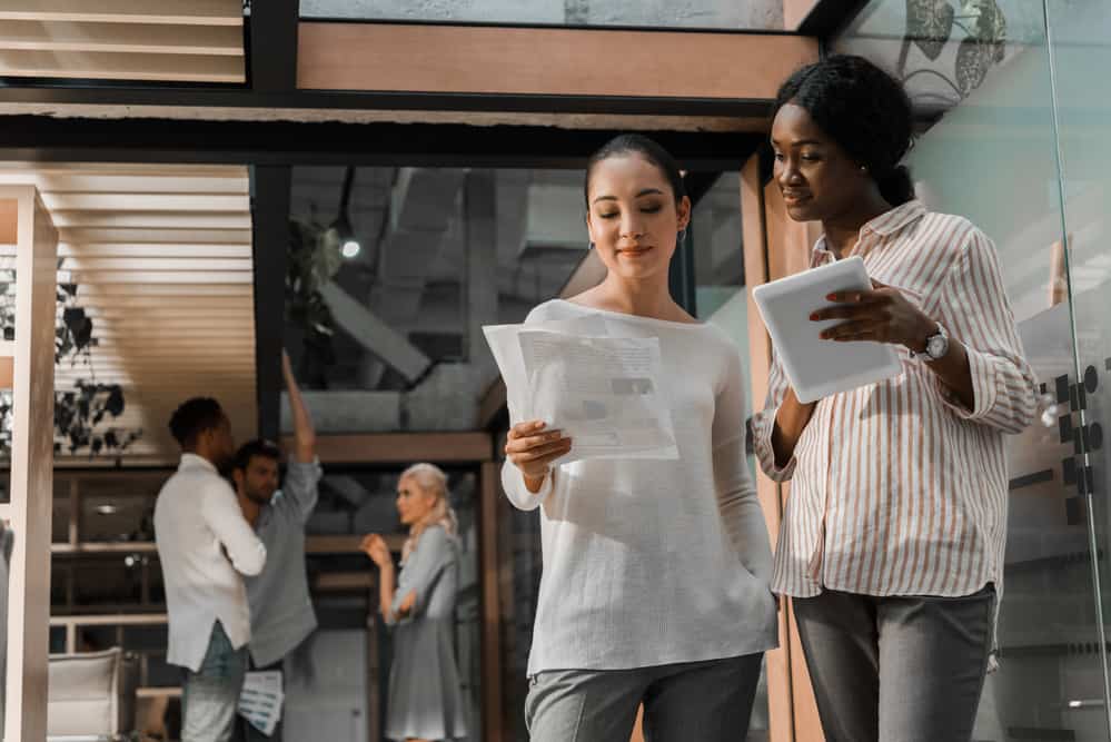 Two women discussing business